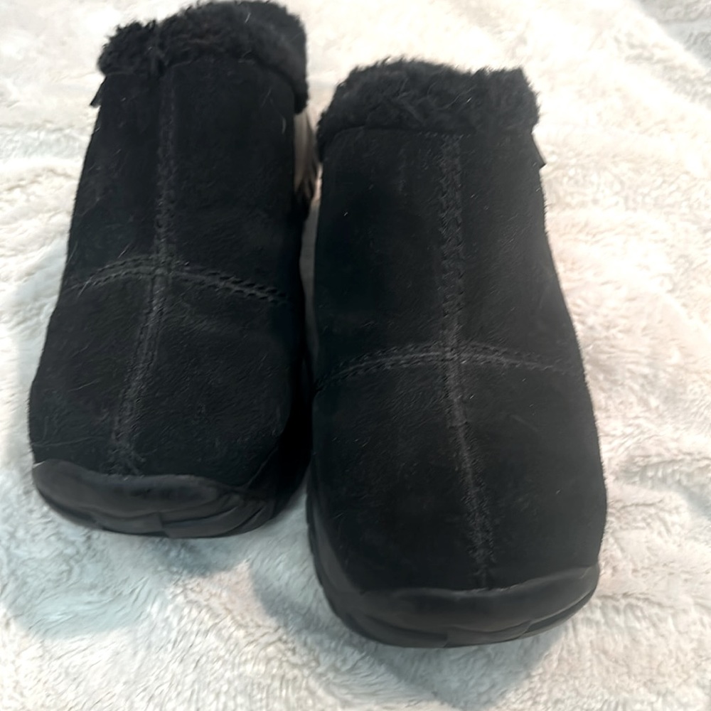 Black, fuzzy rocket dog platform clogs